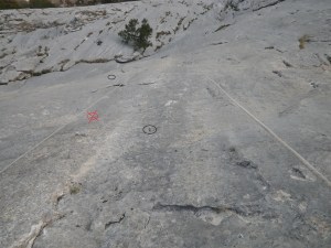 Retrobolting: Red circle - one of the bolts added on SkyWay.There were five added bolts on that pitch. All added bolts were removed. Rebolted placements were left in place.
